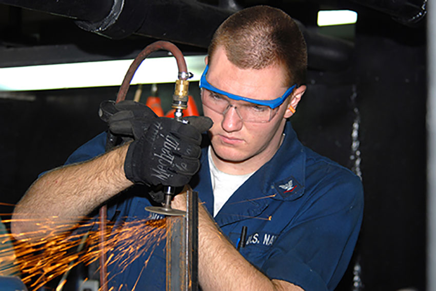 Technician with safety glasses WEB